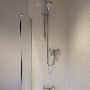 image of shower with tiles bathroom by Sutton & Vining