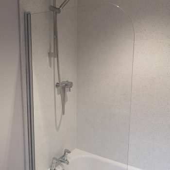 image of bathroom with tiling by Sutton & Vining