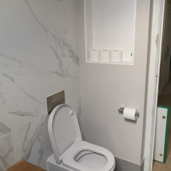 image of bathroom and toilet by Sutton & Vining