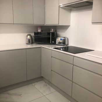 image of grey kitchen by Sutton & Vining