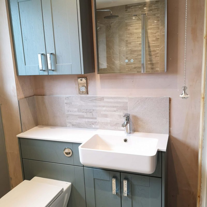 image of bathroom install with mirror unit