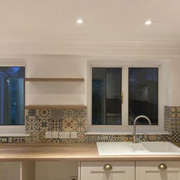 close up image of white kitchen