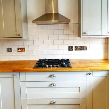 image of white kitchen with white tiles